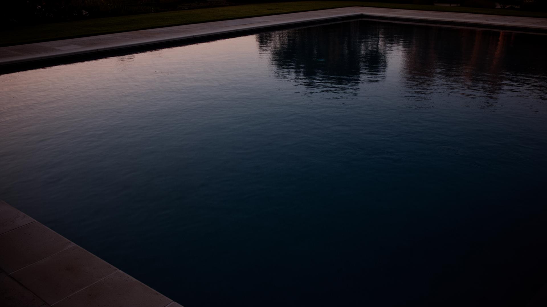 Calm water surface at dawn